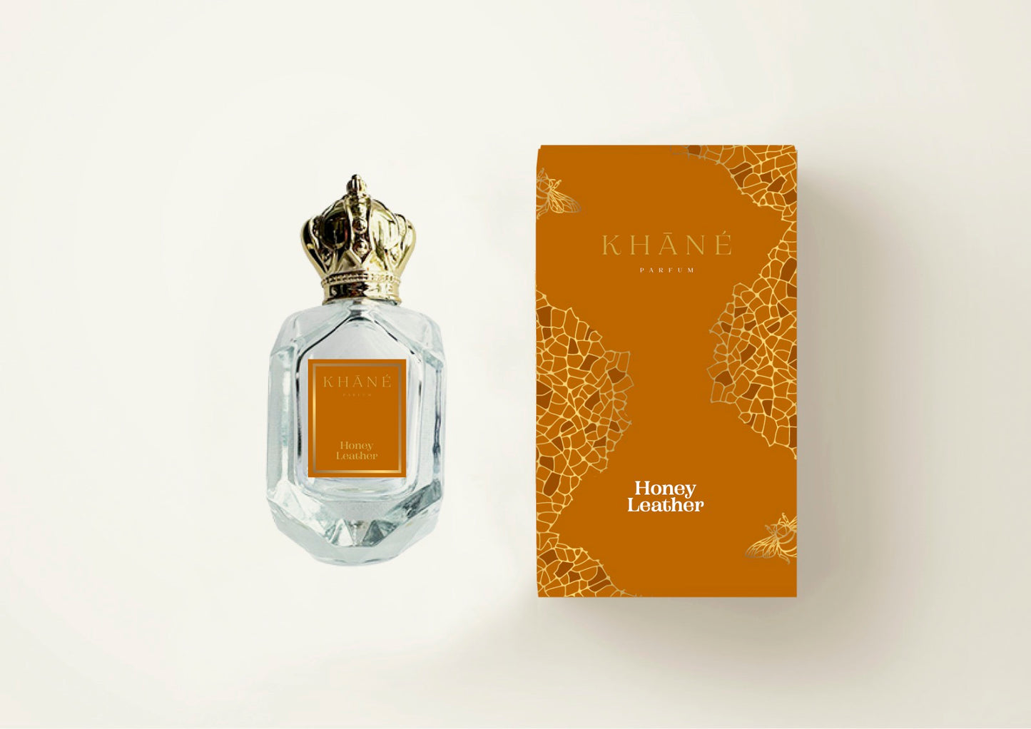 A bottle of Honey Leather perfume placed beside its box, creating an elegant and enticing display.